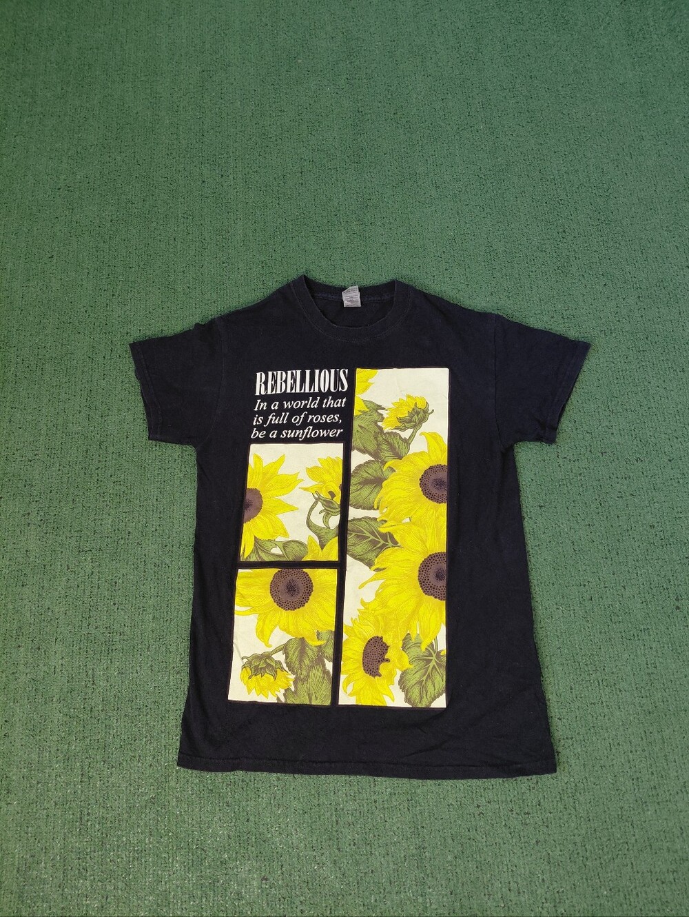 Rebellious "In A World That Is Full Of Roses Be A Sunflower" Quote Unisex Black